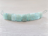 Varied Size Aquamarine Faceted Triangular Cylinders, 10 Count